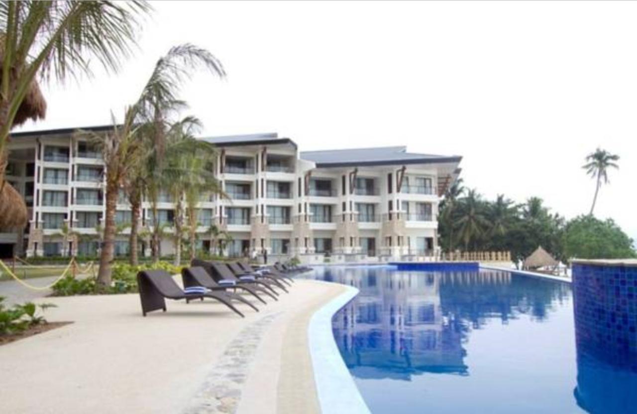 เดอะ เบลเลวู รีสอร์ท ปางเลา ภายนอก รูปภาพ The pool at the resort
